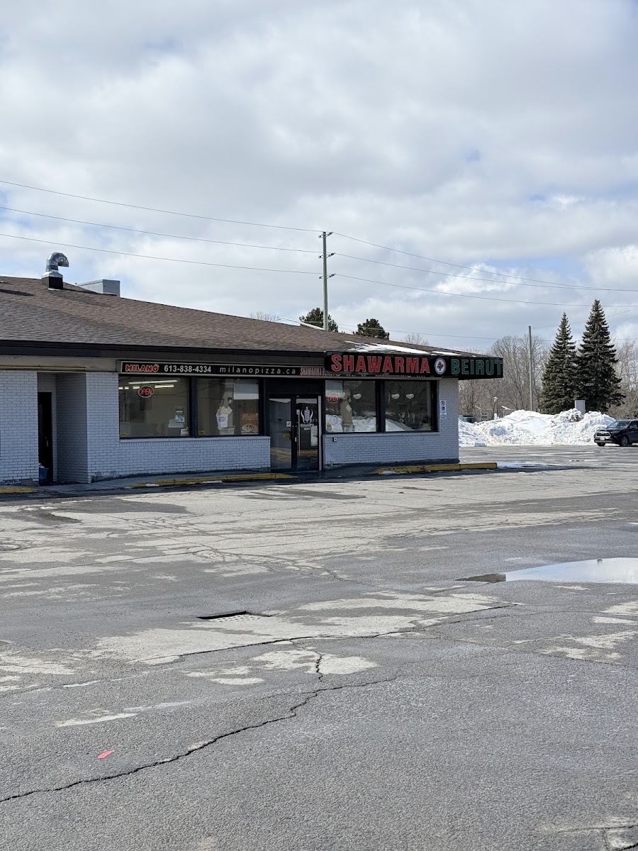 The Shawarma Beirut storefront and parking lot on a snowy day